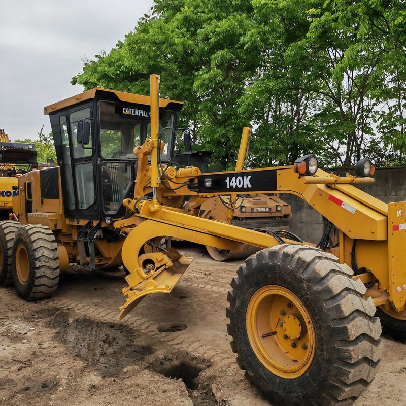 Used excavator land leveller Caterpillar CAT140K roader machine secondhand japan tractor engine  in good condition